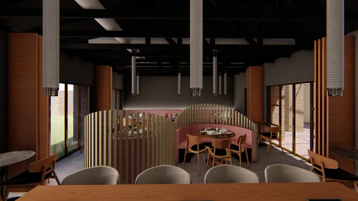Curved timber booths with pink upholstery in a dark-timbered dining room