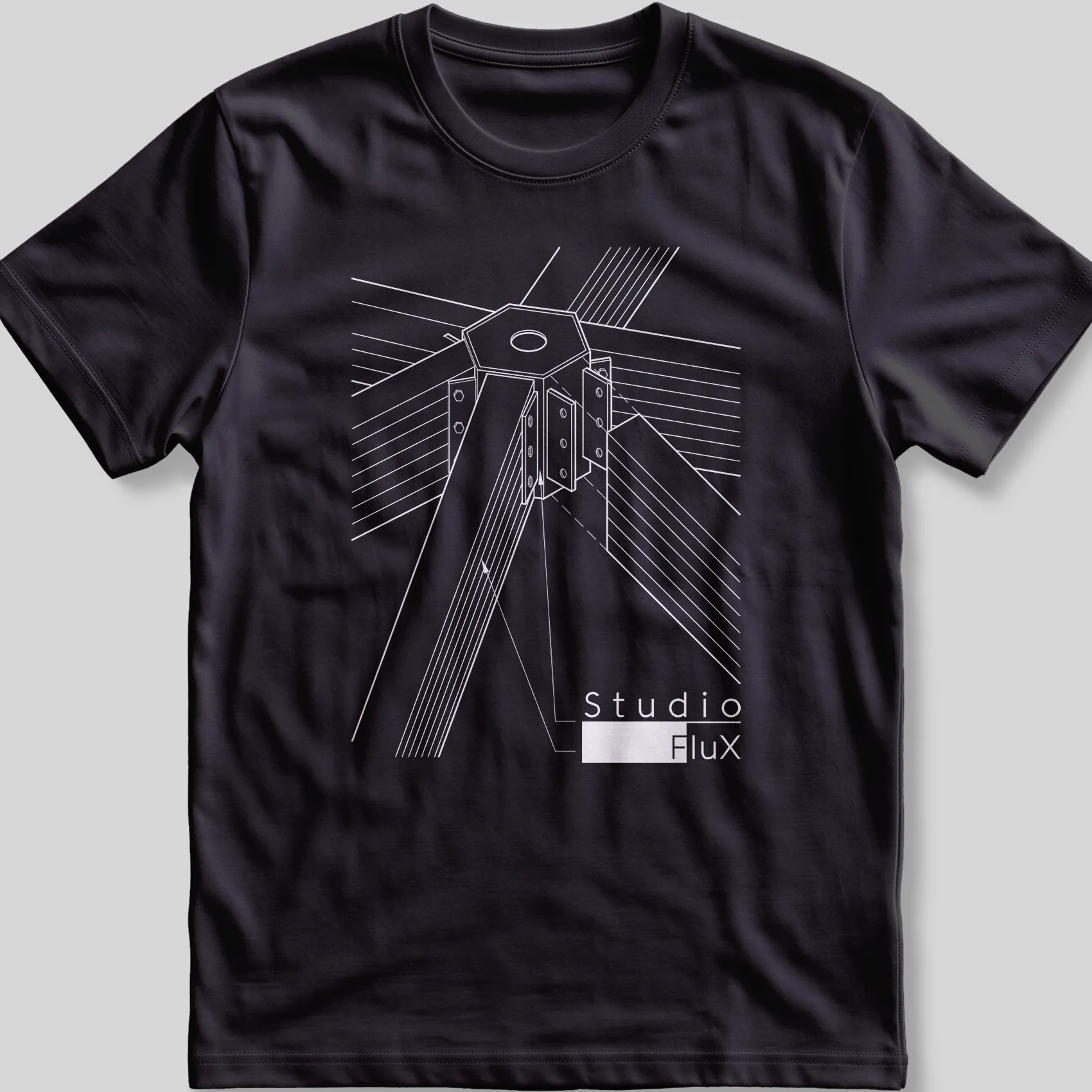 Black T-shirt printed with a white line drawing of a column head and the Studio FluX logo