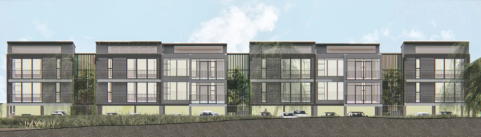 South elevation of the apartment blocks behind trees and grasses