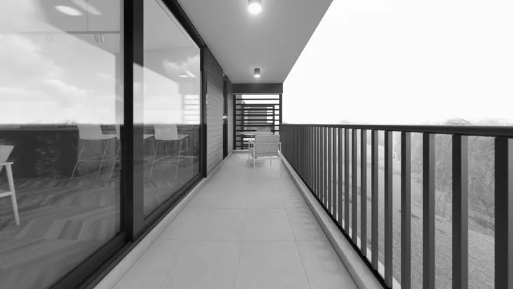 A long balcony with a slatted balustrade and sliding glass doors